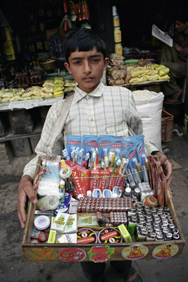 Boy Selling Merchandise in Kathmandu, Nepal